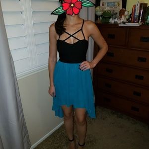 Turquoise and black dress